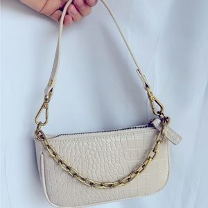 Nice mini bag, cream colour with bronze details